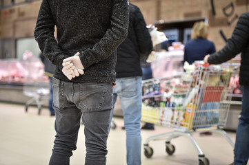 People are shopping in a supermarket couple of days before the orthodox Easter, during the...