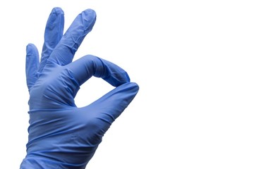 hand in blue latex glove on a white background