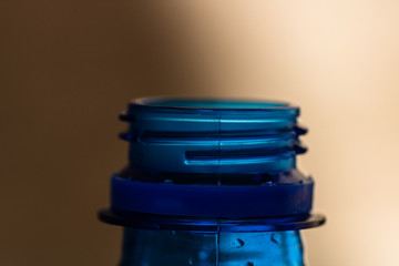 Detail of neck bottle screw on blurry background