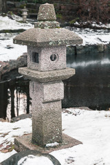 Small Japan stone lantern in public park of Kotka