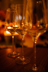 empty wine glasses with a blurred background. Warm color