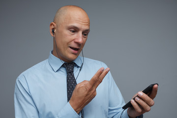 Businessman announces good news over the phone