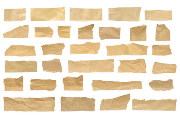 Recycled paper craft stick on a white background. Brown paper torn or ripped pieces of paper isolated on white background.	