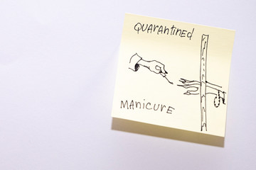 Female hands, girls do manicure in the home quarantine. Drawing with marker on sticker.