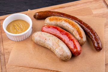 Sausage, sardels and flasks, served to beer with mustard