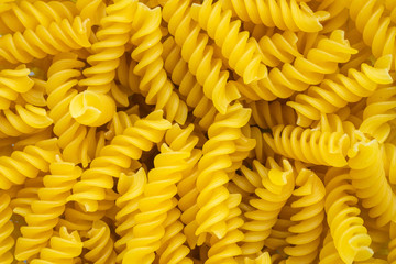 fusilli pasta background texture of food