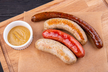 Sausage, sardels and flasks, served to beer with mustard