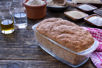 Homemade and handmade bread with cooking materials at home because of coronavirus.