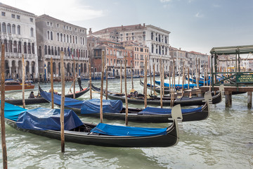 Fototapeta na wymiar Gondolas and Grand Canal in Venice