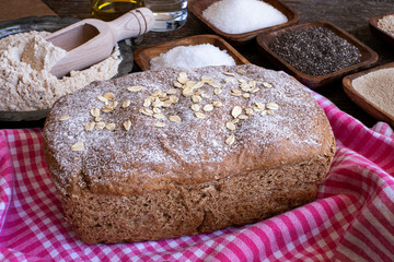 Homemade and handmade bread with cooking materials at home because of coronavirus.