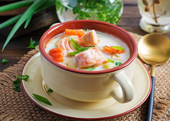 Kalakeitto. Creamy soup with salmon, potatoes, onions and carrots and  in a bowl. Finnish/ karelian cuisine. Lohikeitto