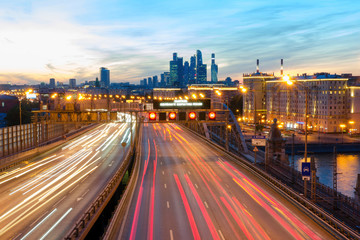 Fototapeta premium City traffic. Night view of Third Road and Moscow city. Moscow, Russia..