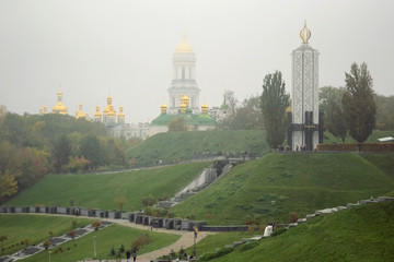 Fototapeta na wymiar Park on the hills in the fog, the city of Kiev - the capital of Ukraine.