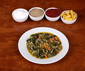 very nice spinach dish for fragrant turkish spicy ad designers on white plate on wooden table