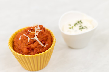 Ajvar paprika spread with tartar sauce in the bowl