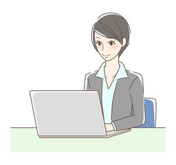 パソコンを操作して笑顔の女性