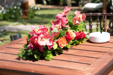 A table decorated with flower bouquet for a party preparation
