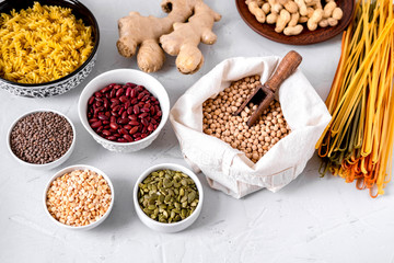 Pasta, lentils, Ginger Root, Chickpeas And Beans In Bowls.