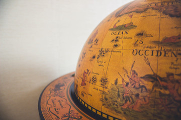 wooden globe on wooden surface