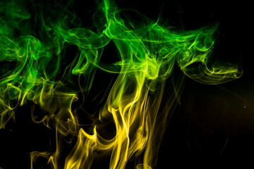 Colored smoke on black background