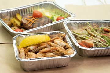 Natural fitness dishes prawns for proper nutrition on self-isolation. The concept of proper nutrition, delivery. Close up.