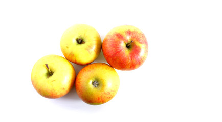 Juicy garden apples on a white background. Healthy fruits.