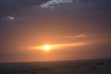 Fototapeta na wymiar Dramatic sunrise in a abstract nature background.