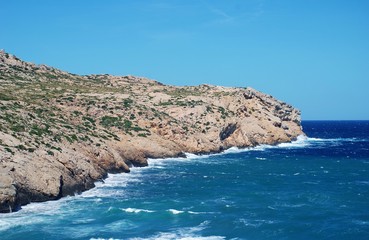Fototapeta na wymiar Rough seas at Cala Barques at Cala San Vicente on the Spanish island of Majorca.