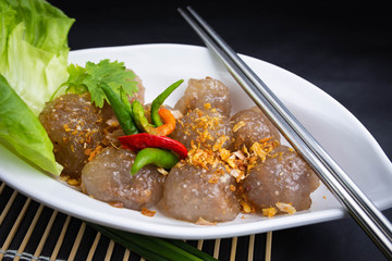 Thai snack Sakoo Sai Moo or steamed tapioca balls filled with pork recipe. Sago Pork Balls Thai Desserts.