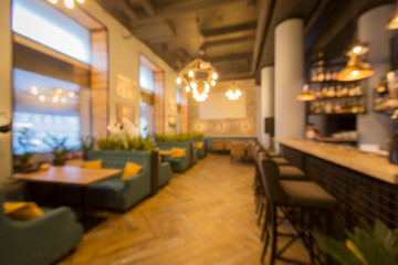 Fototapeta na wymiar Blurred empty restaurant interior, quarantine concept, take away