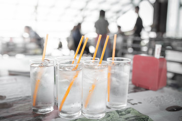 Cool water in glass on blurred background, view in restaurant.