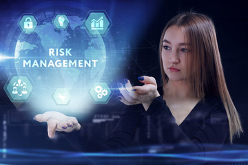 Business, Technology, Internet and network concept. Young businessman working on a virtual screen of the future and sees the inscription: Risk management