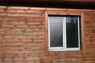 plastic window on wood background. Plastic window in the house.