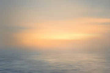 Naklejka na ściany i meble Dawn at the sea. Long exposure. Abstract blur background.