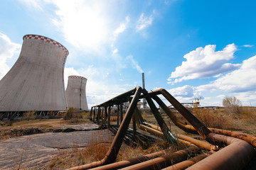 Soaring steam towers of a nuclear power plant.