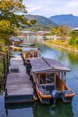 Fototapeta na wymiar Japanese boats. Katsura river in Kyoto