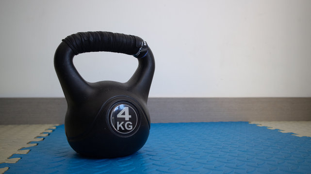 kettlebell on the floor with white background