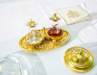 wine and water on the altar to become the blood of jesus christ