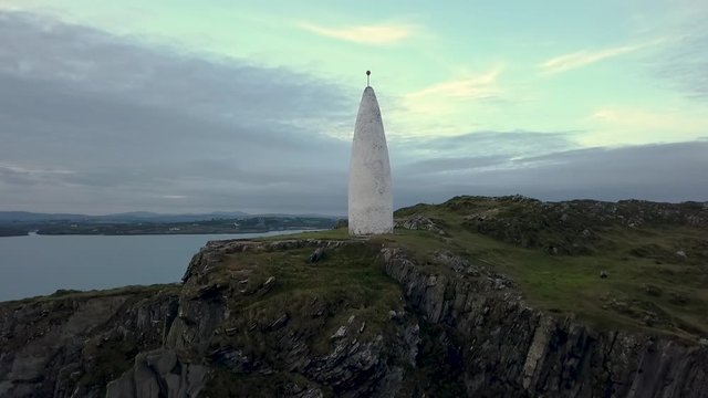 Aerial Irish coastal beacon lighthouse