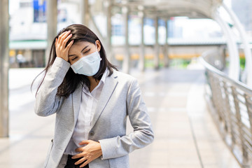 Fototapeta premium Coronavirus a woman wearing face mask on blur background. Coronavirus, healthcare and air pollution concept