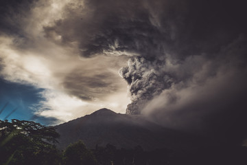 Series of photos from the eruption volcano Agung in Bali. Big smoke and ash cover the sky