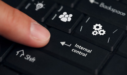Businessman presses button internal control on virtual screens. Business, Technology, Internet and...