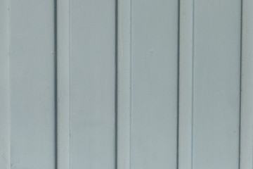 White background with vertical lines (garage door)