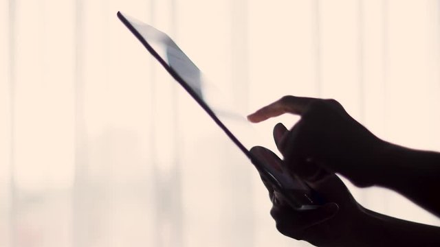 Hands using digital tablet computer