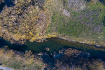Fototapeta na wymiar Aerial view from drone of summer landscape with river, hills and forests.