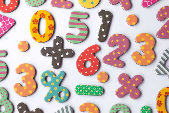 Colorful magnetic random numbers and symbols as an example for teaching in elementary school.