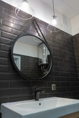 Modern bathroom with shower and wood effect tiling