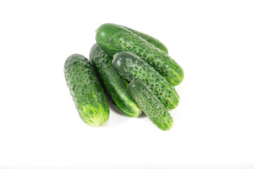 Group of fresh green pickling cucumbers on white background