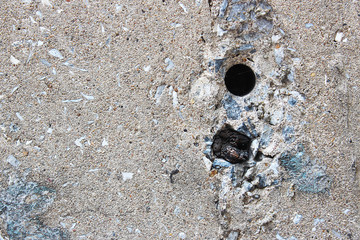 Concrete pillar with a hole punch