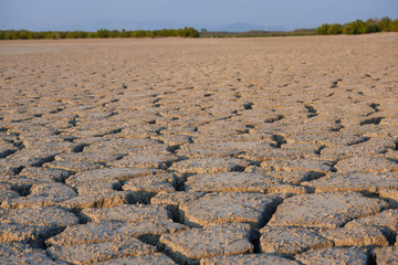 The ground is dry from bad weather.